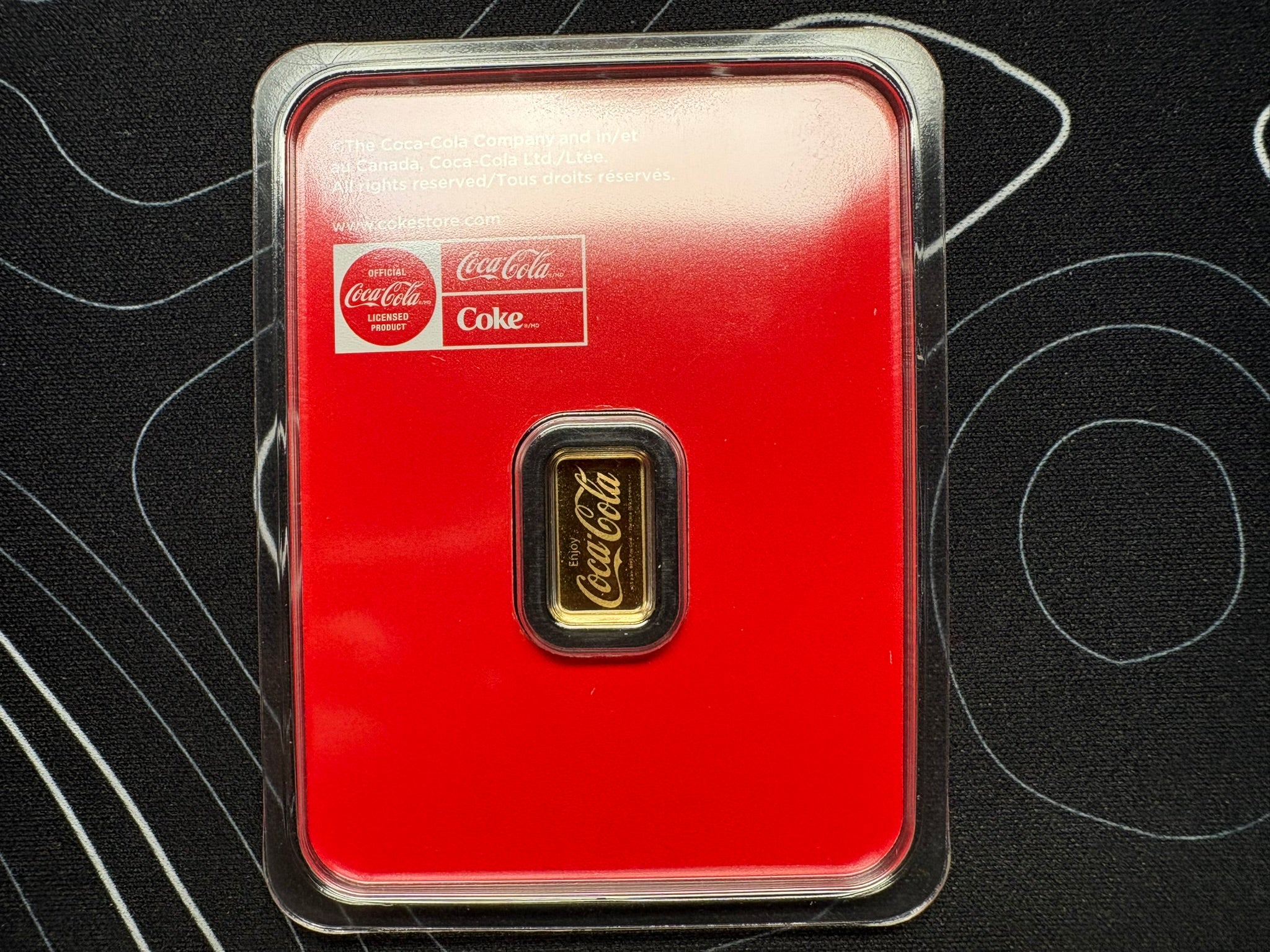 PAMP Suisse Coca-Cola 0.5g .9999 Gold Bar | Gems Bullion